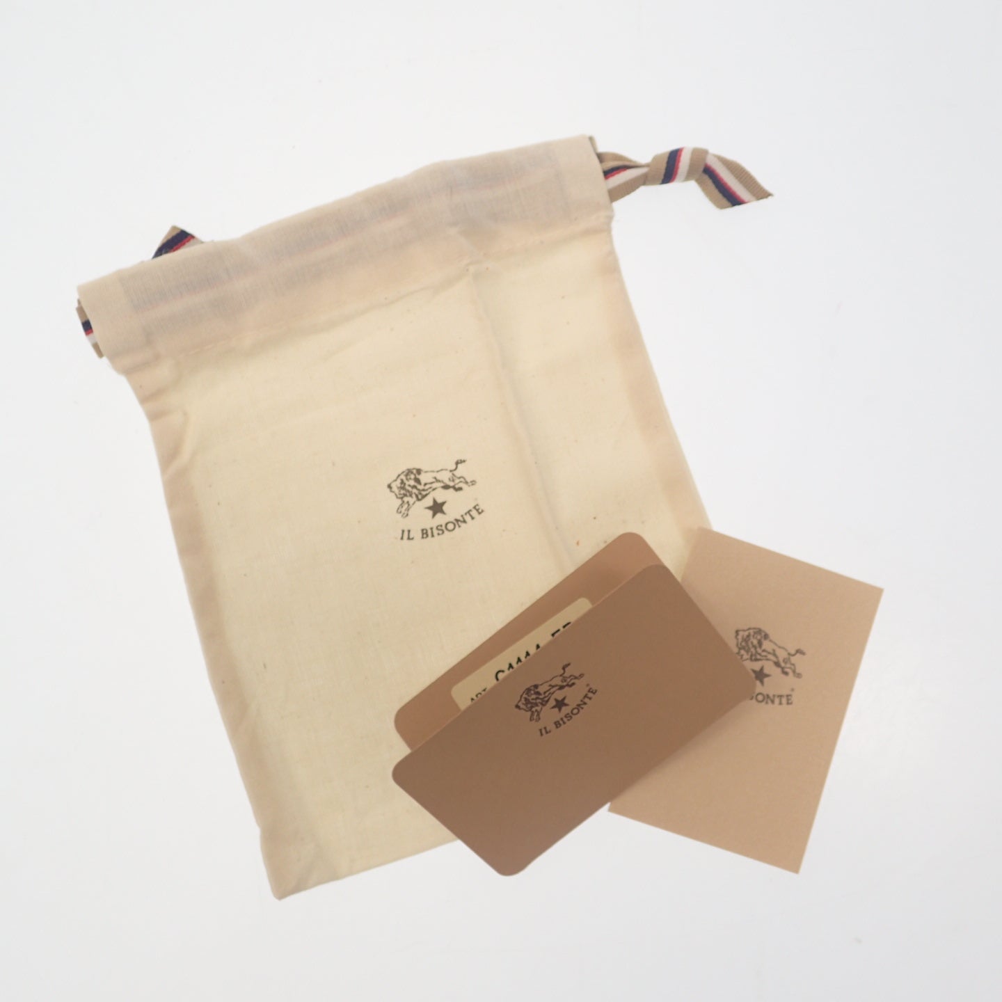 新品同様◆イルビゾンテ がま口 二つ折り財布 レザー オレンジ系 IL BISONTE【AFI9】