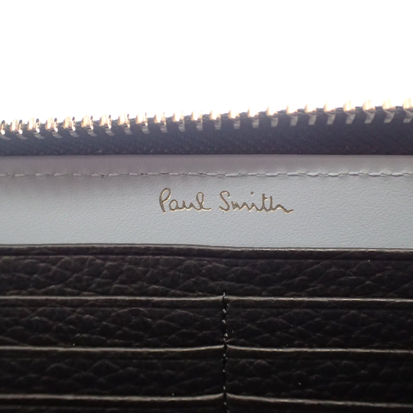 新品同様◆ポールスミス レザー ラウンドジップ 長財布 メンズ 黒×ネイビー系 Paul Smith【AFI1】