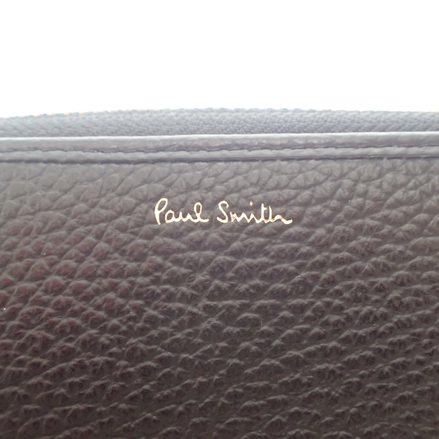 新品同様◆ポールスミス レザー ラウンドジップ 長財布 メンズ 黒×ネイビー系 Paul Smith【AFI1】