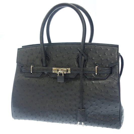 Very good condition◆JRA Ostrich leather handbag Birkin type black silver hardware with padlock and key [AFE11] 